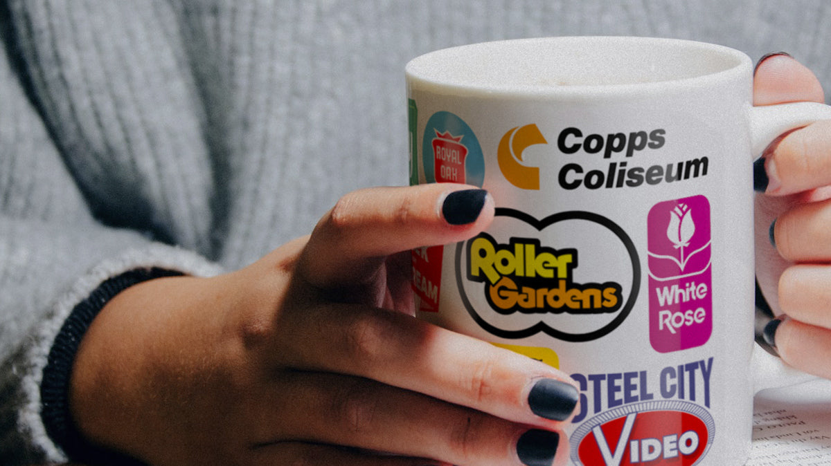 Close up of hands grasping a mug